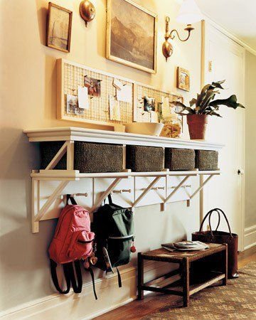 Coats and school bags hung by the front door