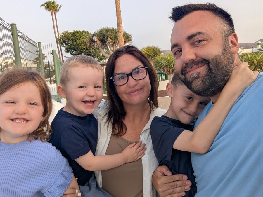 Tom with his wife and their three children
